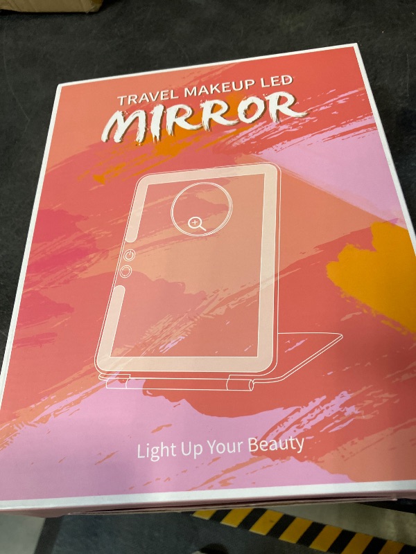 Photo 1 of FUNTOUCH Portable Makeup Mirror with Light
