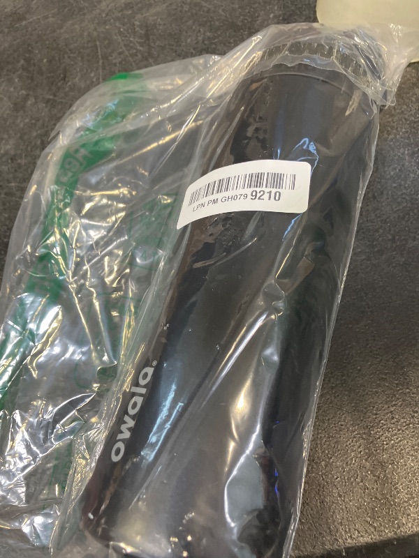 View 2 of Owala FreeSip Insulated Water Bottle 24 oz Very, Very Dark