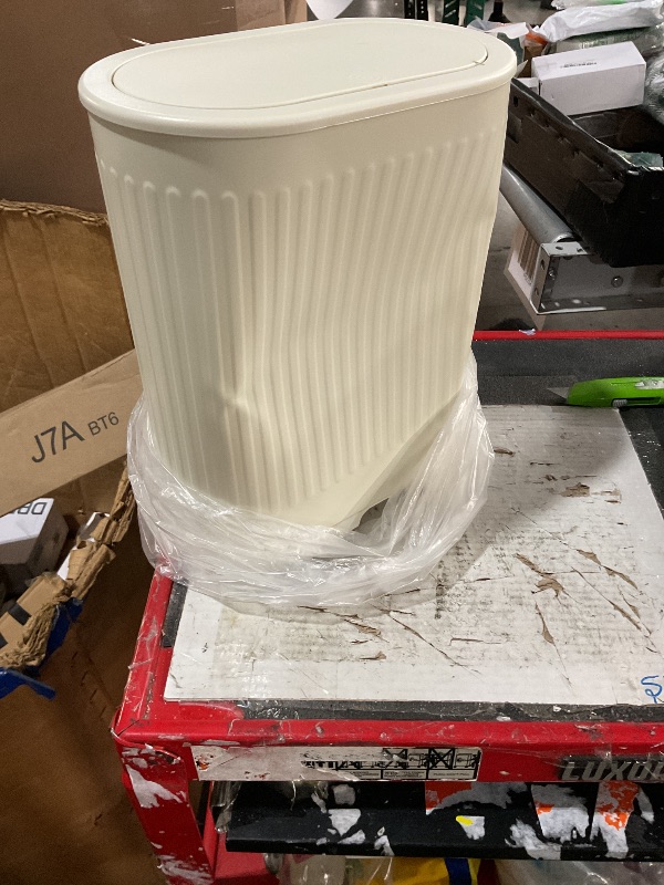 View 3 of ** has a dent on it **
QINOFEN Small Wastebasket with Lid