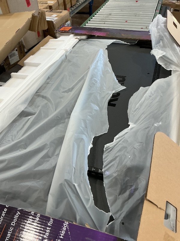Photo 1 of Roku Plus Series 65-Inch QLED 4K Smart TV