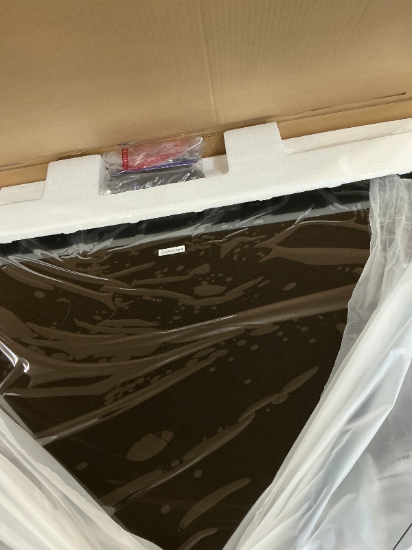 Photo 1 of Roku Plus Series 65-Inch QLED 4K Smart TV