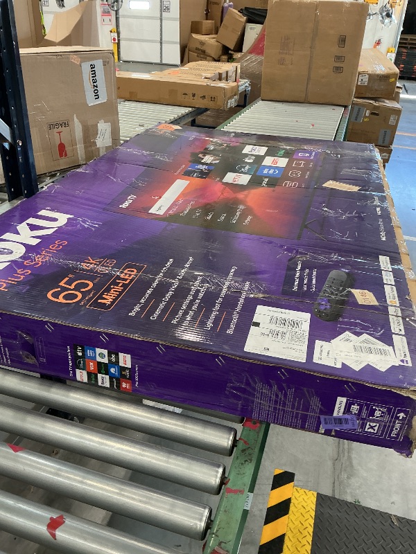 Photo 1 of Roku Plus Series 65-Inch QLED 4K Smart TV