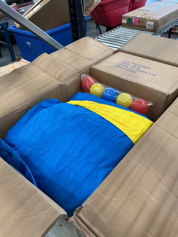 Photo 1 of Inflatable Bounce House or Water Slide Wet or Dry with Sun Roof, Ball Pit 30 Balls, Water Gun, Fun Bouncing Area with Basketball Hoop, Long Slide with Climbing Wall, UL Certified Blower Included