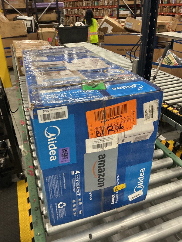 Photo 1 of Midea 14,000 BTU Portable Air Conditioner with Heat, Cools up to 450 Sq. Ft