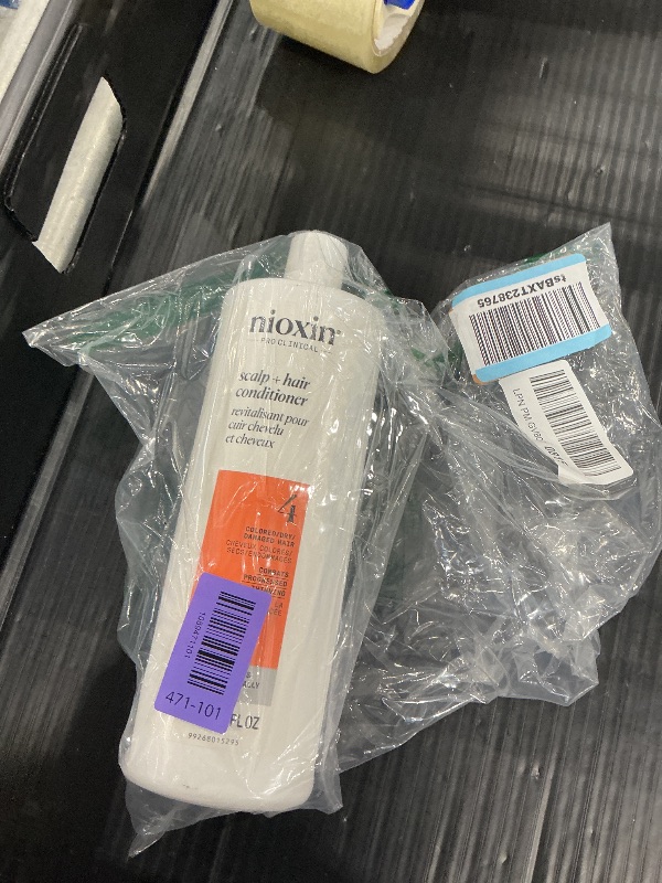 Photo 1 of NIOXIN System 4 Thickening Conditioner for Colored Dry Hair