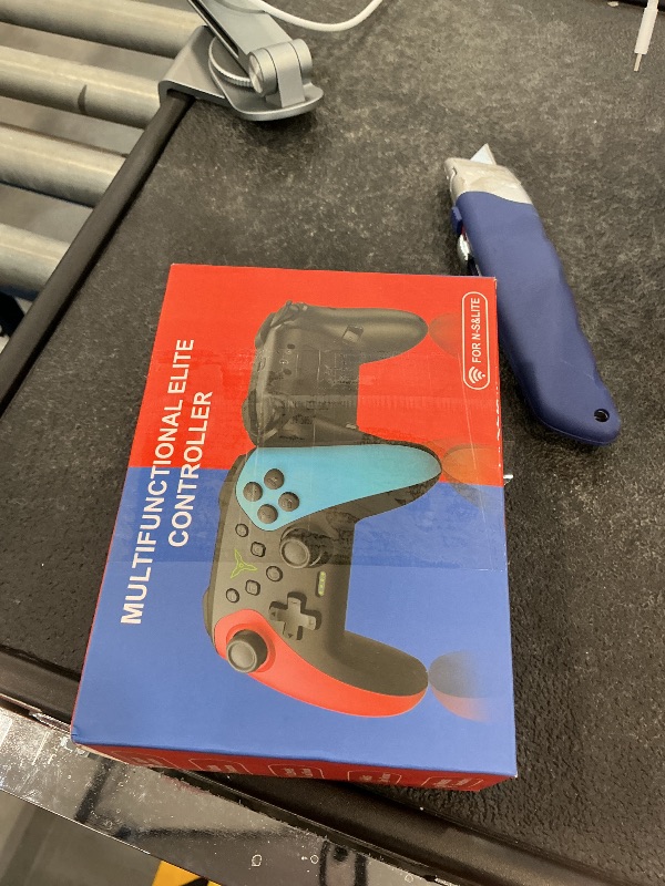 Photo 1 of ELISWEEN Wireless Switch Controller - Red/Blue