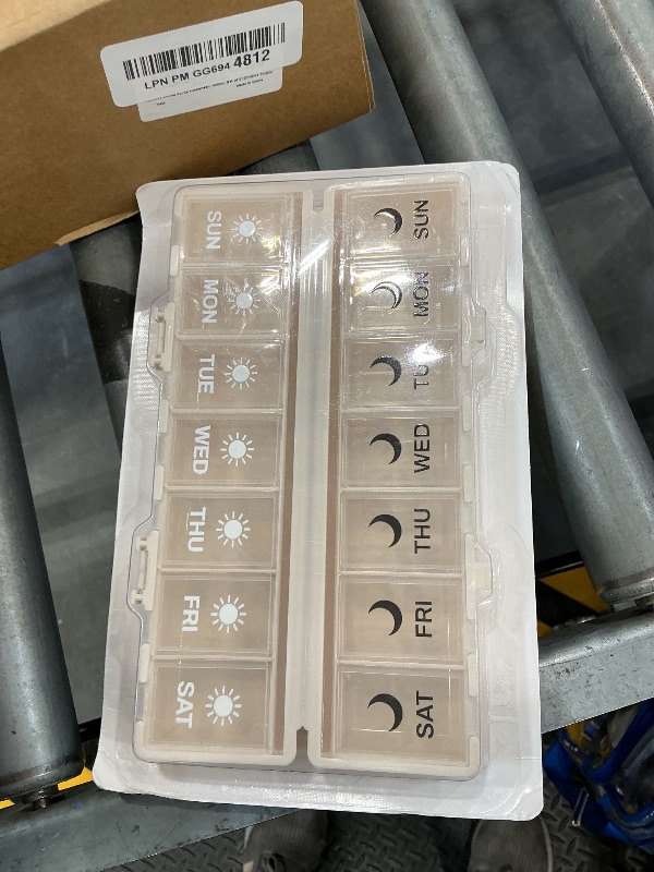 Photo 1 of AOZITA 7 Day AM PM Pill Organizer