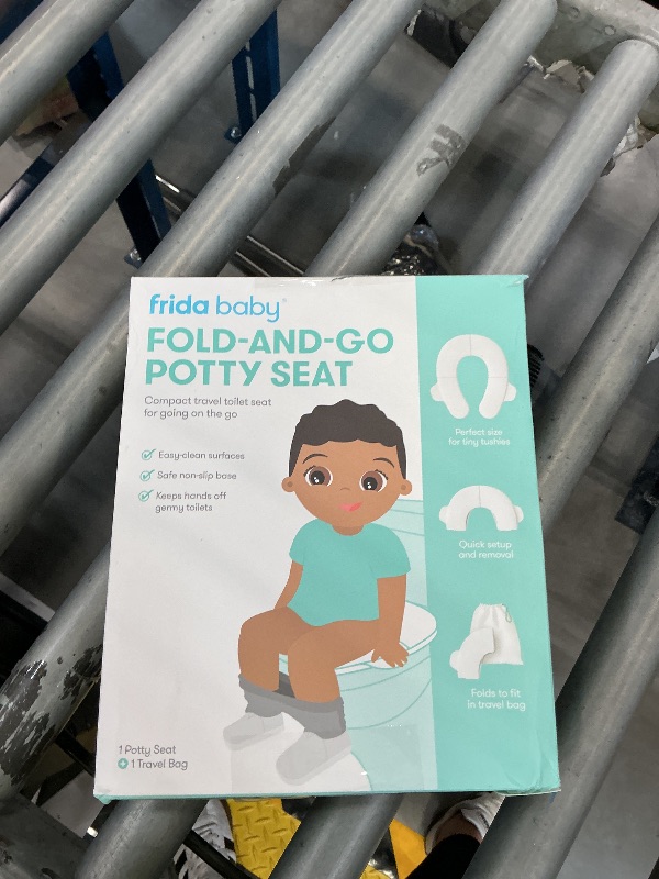 Photo 1 of Frida Baby Fold-and-Go Portable Potty Seat