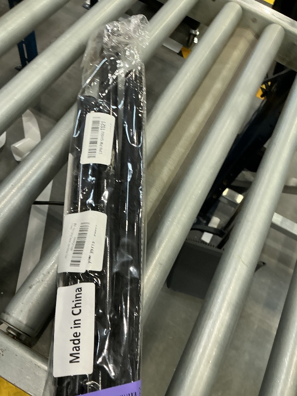 Photo 1 of MEXAU Black Spring Tension Curtain Rod 28-52 Inches