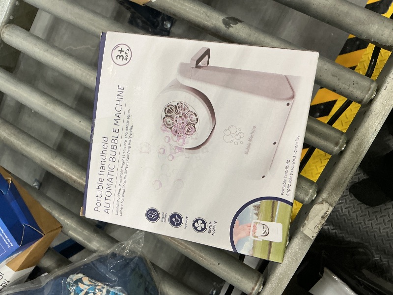 Photo 1 of IFLOVE Automatic Bubble Machine for Kids