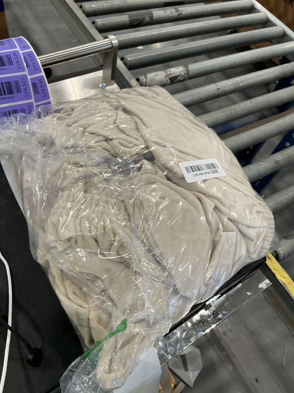 Photo 1 of Tan fabric cover