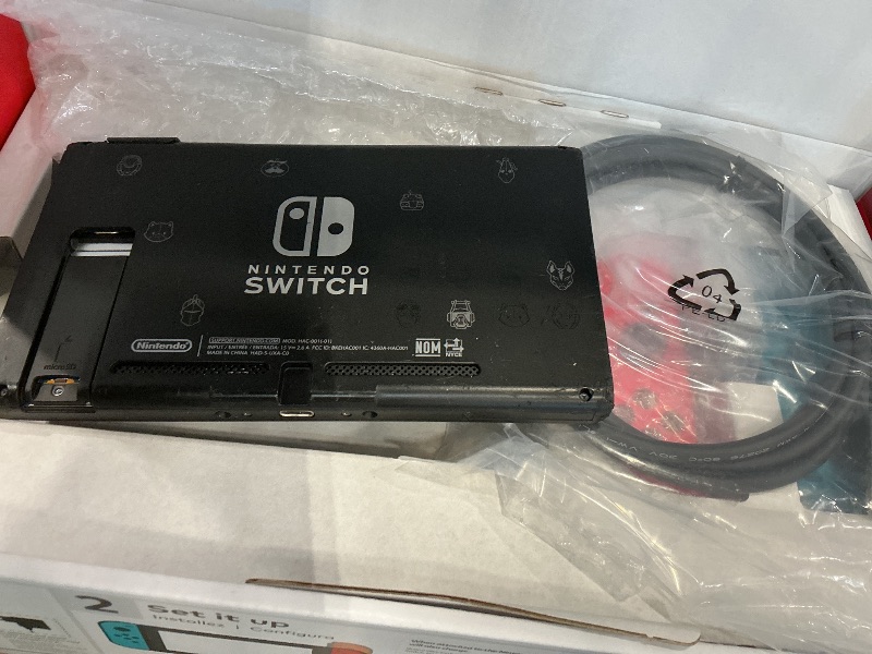 Photo 1 of Nintendo Switch Console with Neon Blue and Red Joy-Con