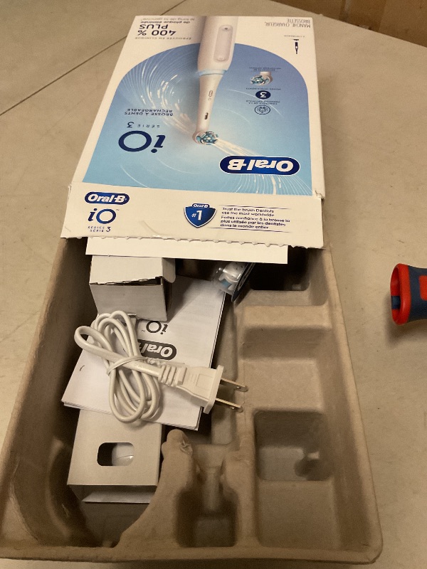 Photo 1 of Oral-B iO3 Rechargeable Electric Toothbrush, White