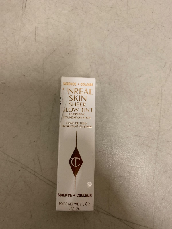 Photo 1 of Charlotte Tilbury Unreal Skin Tint Foundation Stick