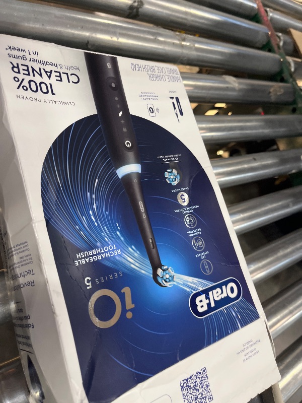 Photo 1 of Oral-B Rechargeable Electric Toothbrush, iO5 Customizable Clean, 5 Cleaning Modes, Visual Pressure Sensor to Protect Gums, Travel Case, Black