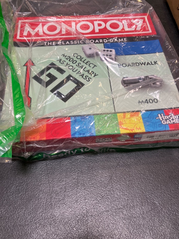 Photo 1 of Monopoly The Mega Edition Board Game with Speed Die