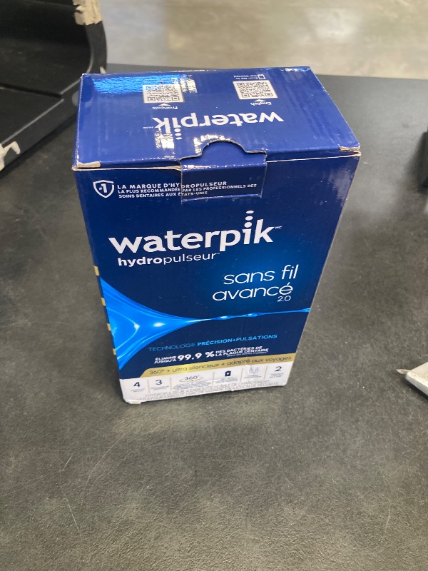 Photo 1 of Waterpik Cordless Advanced Water Flosser - White