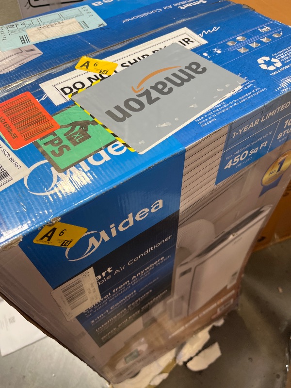 Photo 1 of Midea 14,000 BTU Portable Air Conditioner