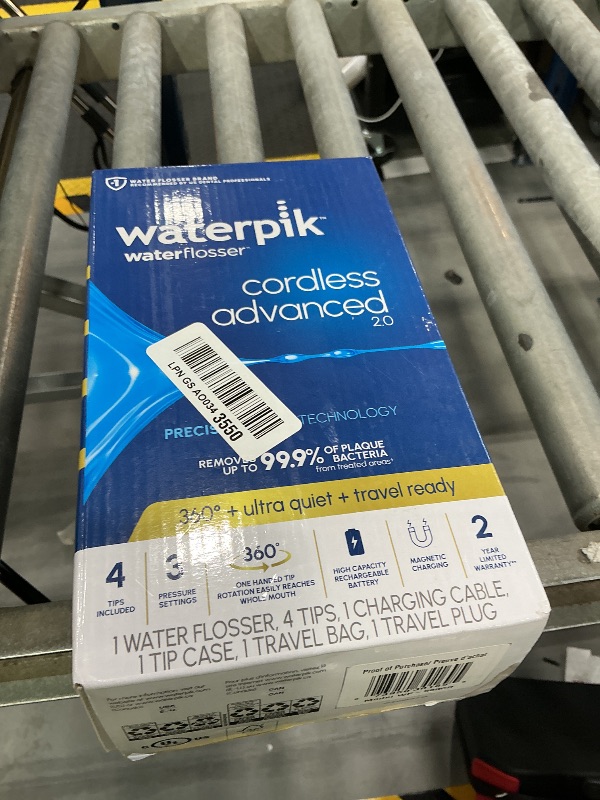 Photo 1 of Waterpik Cordless Advanced Water Flosser - White