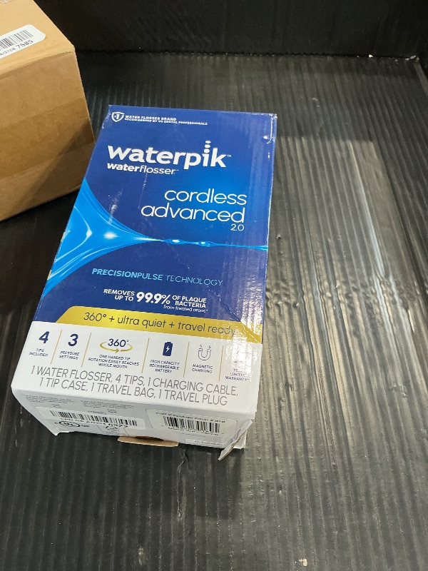 Photo 1 of Waterpik Cordless Advanced Water Flosser - White
