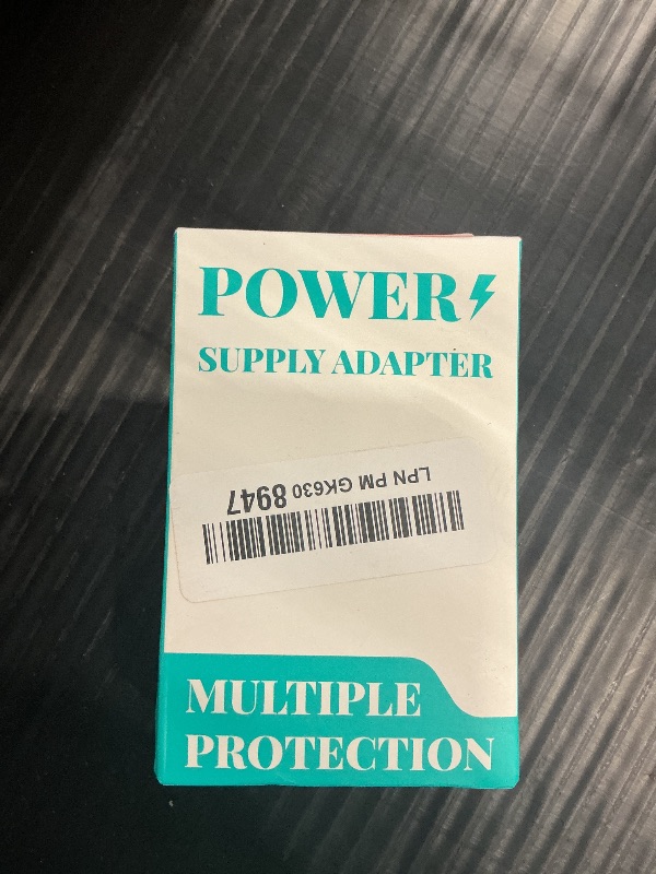 Photo 1 of WZR 12V 2A Power Supply Adapter
