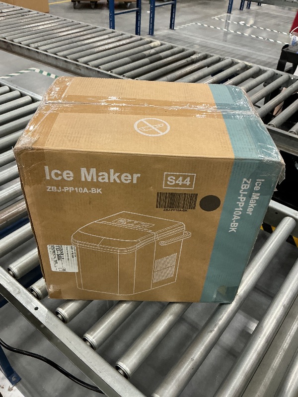 Photo 1 of NEWBULIG Ice Makers Countertop with Handle, Portable Ice Machine, 9 Bullet Ice Cubes in 6 Mins, 26lbs in 24Hrs, Auto-Cleaning, with Basket and Scoop, for Home, Kitchen, RV, Camping,Black