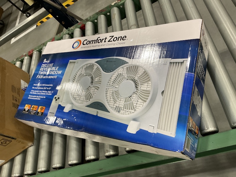Photo 1 of COMFORT ZONE 9" Smart Reversible Twin Window Fan with WiFi & Remote