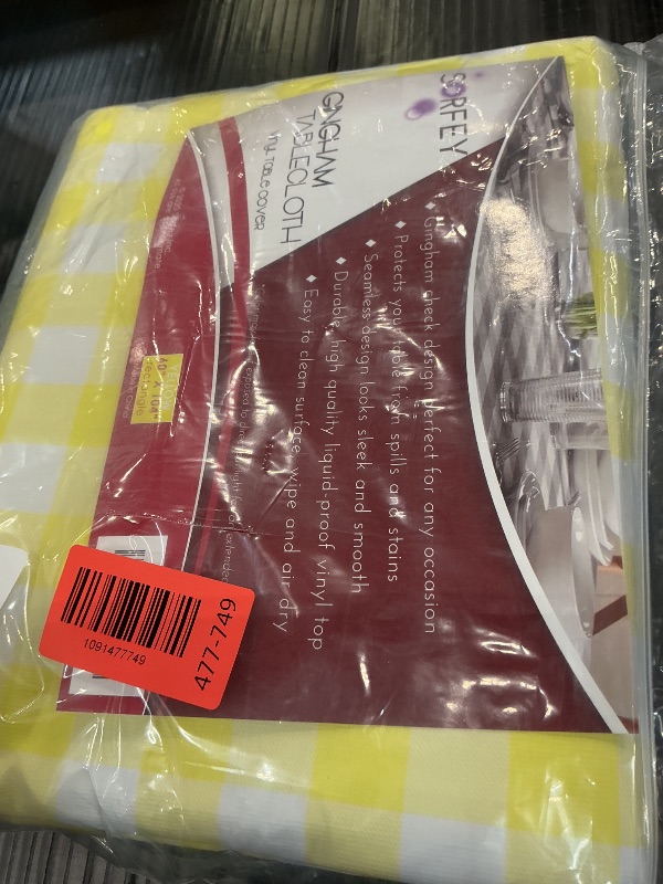 Photo 1 of Sorfey Checked Vinyl Tablecloth - 70" Round, Yellow