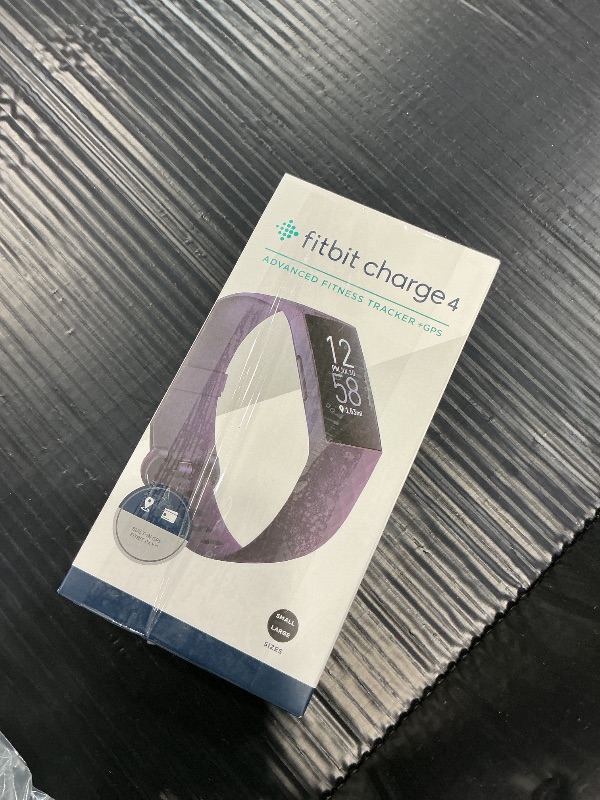 Photo 1 of Fitbit Charge 4 Activity Tracker