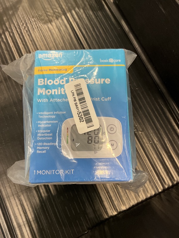 Photo 1 of Amazon Basic Care Wrist Blood Pressure Monitor - Digital BP Monitor with Large Display and Intelligent Inflation Technology