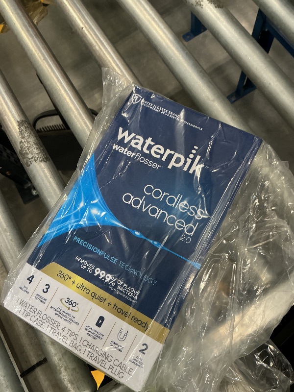 Photo 1 of Waterpik Cordless Advanced Water Flosser - White