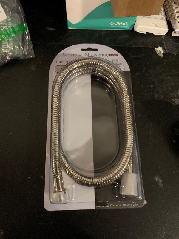 Photo 1 of DELTA Stretchable Metal Hose, Polished Nickel