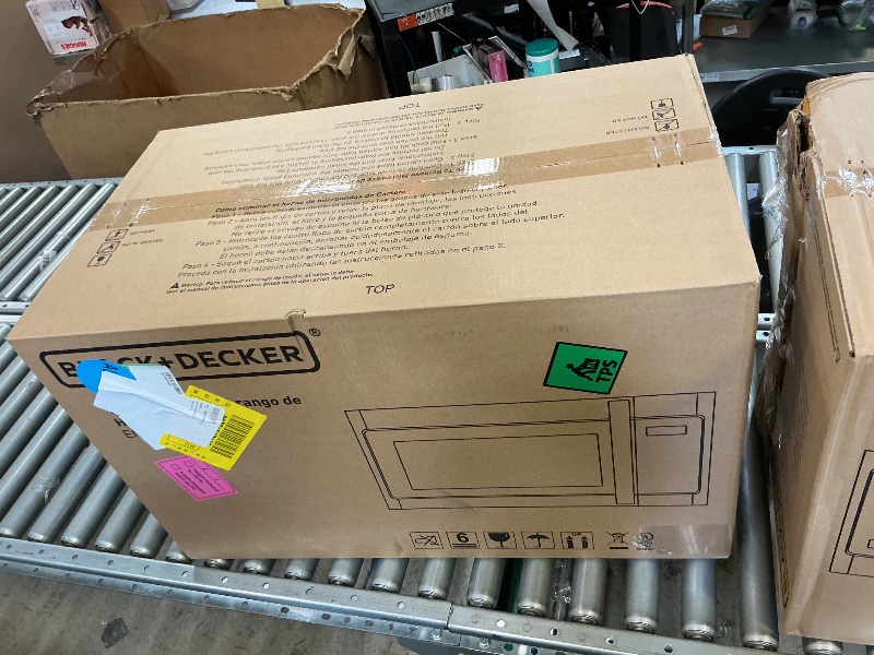 Photo 1 of BLACK+DECKER Over the Range Microwave Oven, 1.7 Cu.Ft, 1000W,