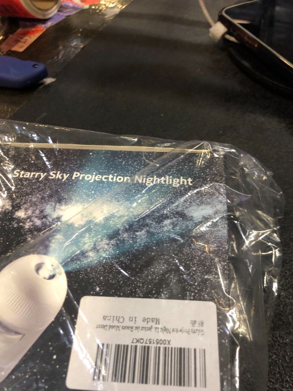 Photo 1 of Vadeny Galaxy Projector Night Light, 12-Disc Starry Sky Lamp