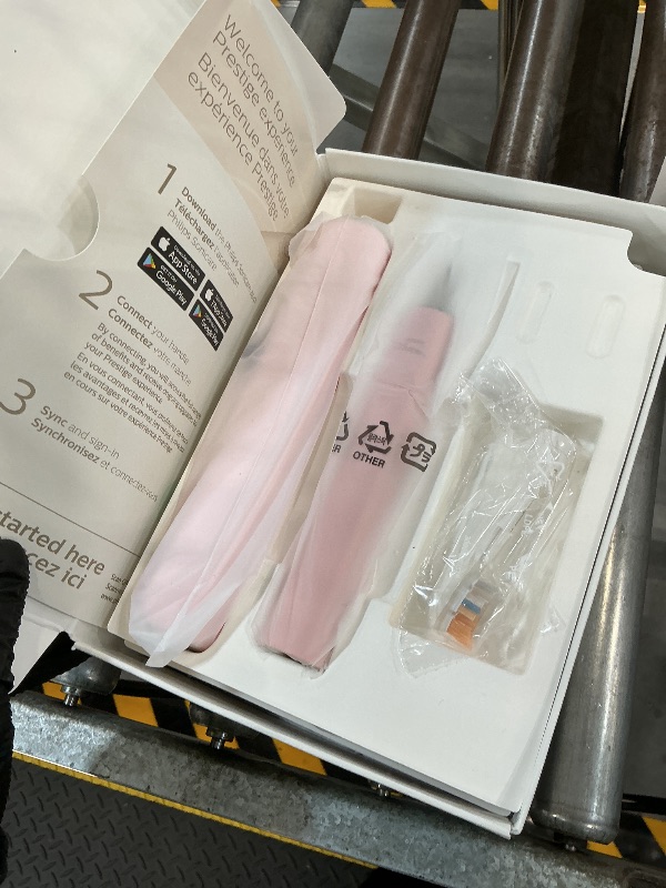 View 2 of Philips Sonicare 9900 Prestige Electric Toothbrush, 1 Brush Head, Pink