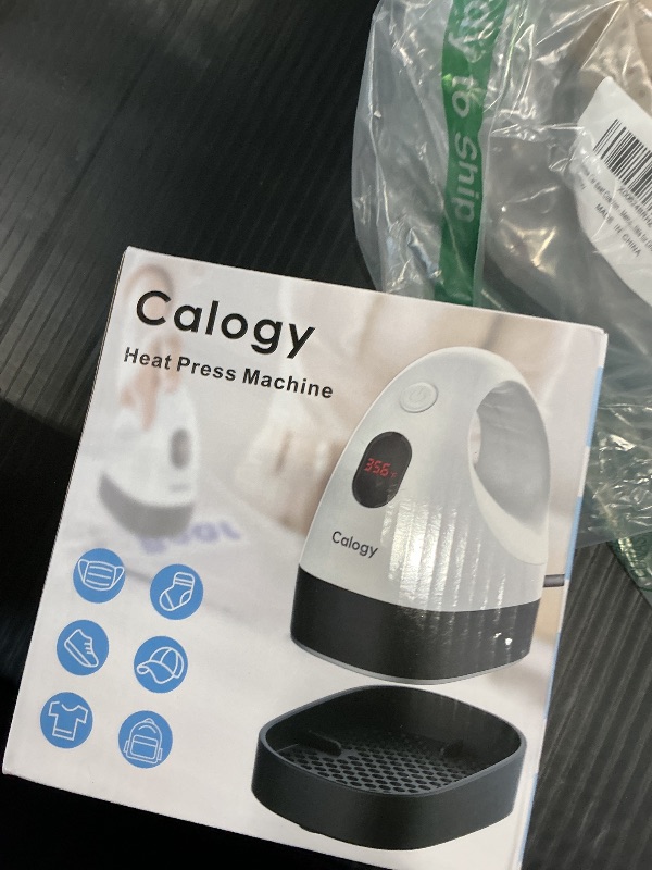 Photo 1 of Calogy Mini Heat Press Machine