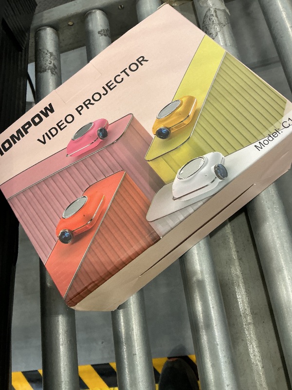 Photo 1 of HOMPOW Mini Projector, 1080P Supported Portable Bluetooth projector