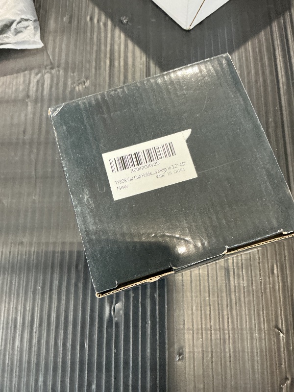 Photo 1 of TYKOR Car Cup Holder Expander with Offset Base