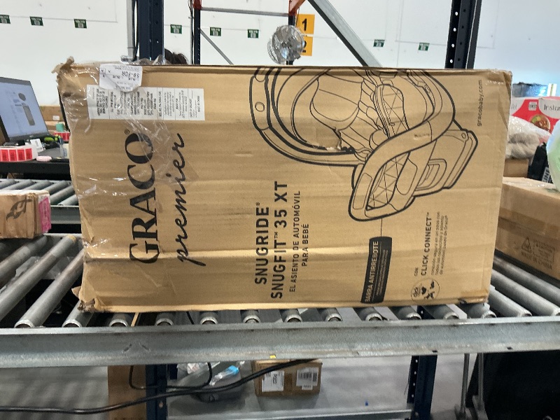 View 3 of Graco® Premier SnugRide SnugFit XT Infant Car Seat, Anti Rebound Bar for Extra Safety, SnugLock Easy Install, Privacy Drape, Storage Pocket, Baby Car Seat, Midtown