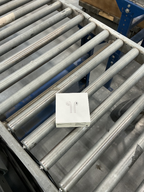 Photo 1 of Apple AirPods Wireless Earbuds with Lightning Charging Case