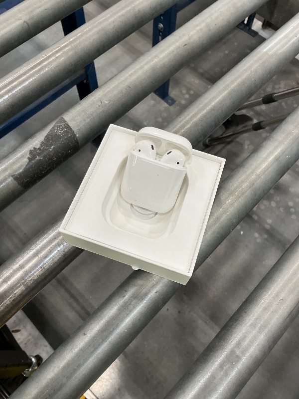 Photo 1 of Apple AirPods Wireless Earbuds with Lightning Charging Case