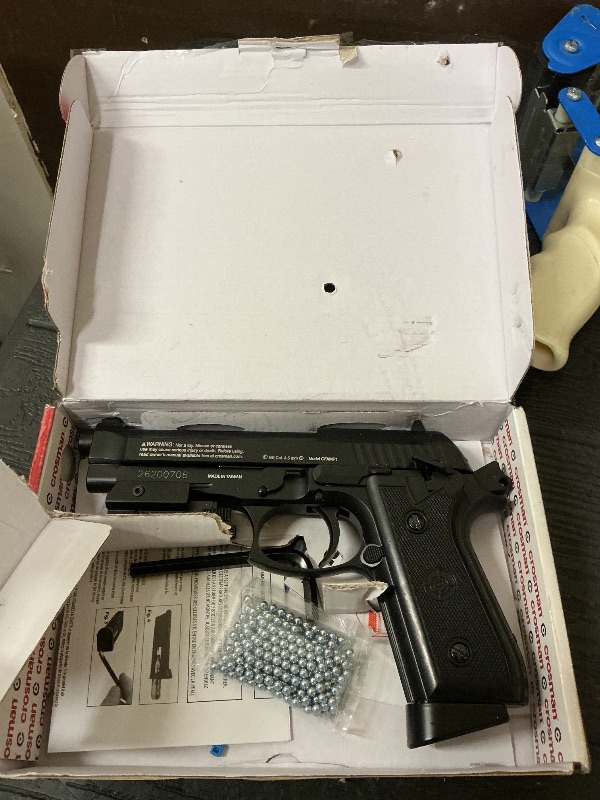 Photo 1 of Crosman CFAMP1L Full Auto P1 CO2-Powered BB Air Pistol With Laser Sight (Class II <1 mW)