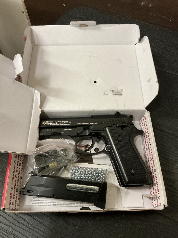 Photo 1 of Crosman CFAMP1L Full Auto P1 CO2-Powered BB Air Pistol With Laser Sight (Class II <1 mW)