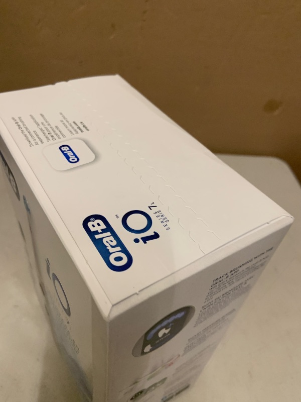 Photo 1 of Oral-B Rechargeable Electric Toothbrush, iO7 Limited Deep Clean + Protect, 5 Cleaning Modes, Interactive Display, Visible Pressure Sensor, 2 Brush Heads, Charging Travel Case, White