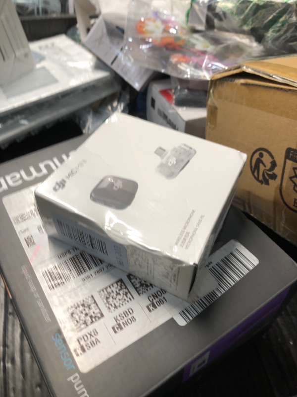 View 2 of ***FACTORY SEALED - OPENED FOR INSPECTION***
DJI Mic Mini (2 TX + 1 Mobile RX), Ultralight, Active Noise Cancelling