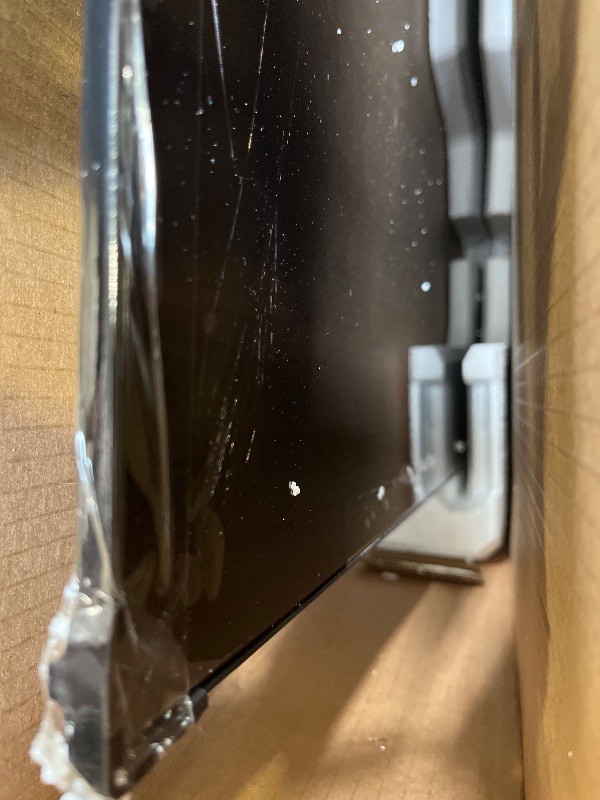 Photo 1 of Samsung 65-Inch 4K Mini LED Smart TV (MAJOR CRACK AND DAMAGES TO SCREEN)