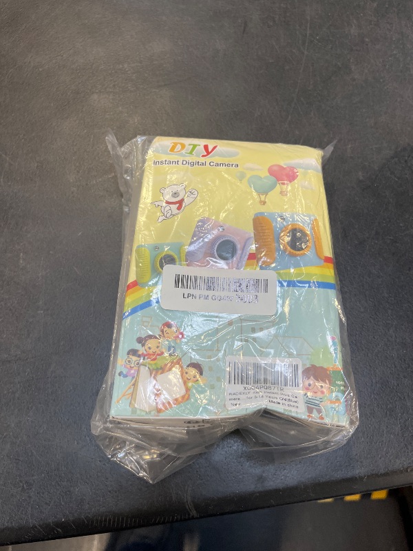 View 2 of RADEKLY Instant Print Camera for Kids, Blue Orange