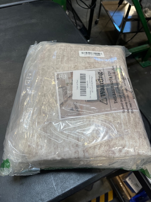 View 2 of Restydon 2'x10' Runner Rug - Beige/Ivory