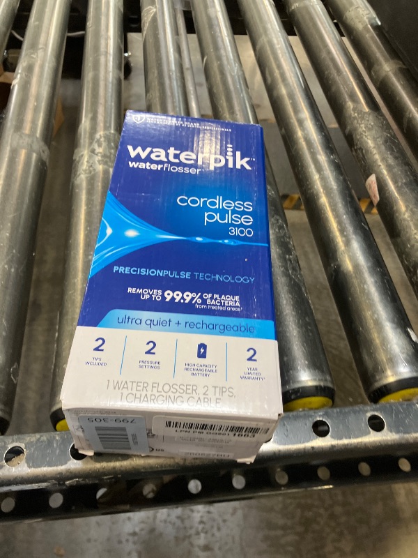 Photo 1 of Waterpik Cordless Pulse 3100 Water Flosser, Cyan