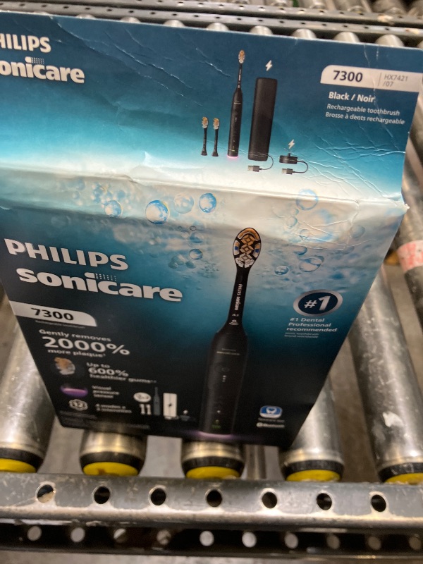 View 3 of Philips Sonicare 7300 Rechargeable Electric Toothbrush, 3 Brush Head, Black